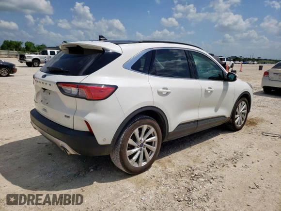 2021 Ford Escape Titanium Hybrid z VIN 1FMCU0DZ6MUA03327, wystawiony jako Copart lot #59558845 z przebiegiem 67 569 mil mil oraz Czysty tytuł • Clean title. Historia ofert i sprzedaży dostępna na DreamBid. Obrazek 3.