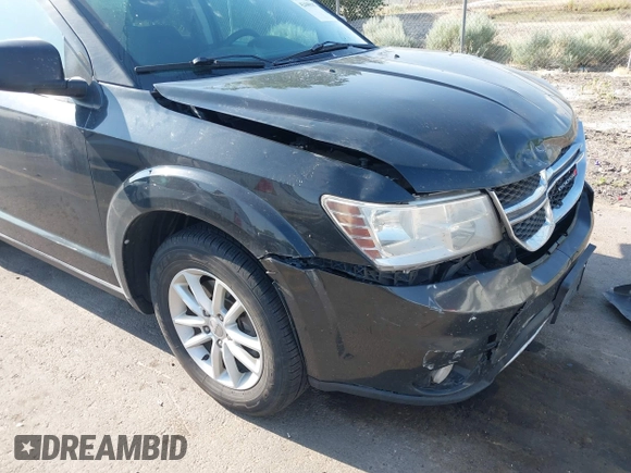 2013 Dodge Journey SXT with VIN 3C4PDDBG1DT606887, listed as a IAAI auction lot 42440507 with 250,836 mi miles and . Bid and sale history available at DreamBid. Image 12.