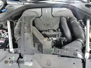 2022 Genesis GV70 Sport with VIN KMUMCDTC3NU013005, listed as a Copart auction lot 67520315 with 31,307 mi miles and Salvage title. Bid and sale history available at DreamBid. Image 14.