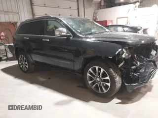 2017 Jeep Grand Cherokee Overland z VIN 1C4RJFCG9HC818692, wystawiony jako IAAI lot #42010504 z przebiegiem 112 686 mil mil oraz . Historia ofert i sprzedaży dostępna na DreamBid. Obrazek 1.