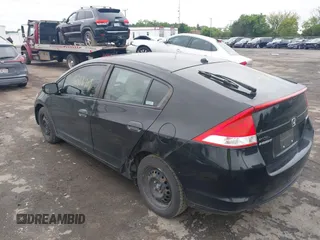 2010 Honda Insight LX z VIN JHMZE2H59AS037444, wystawiony jako IAAI lot #42358409 z przebiegiem 201 680 mil mil oraz . Historia ofert i sprzedaży dostępna na DreamBid. Obrazek 3.