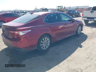 2019 Toyota Camry LE with VIN 4T1B11HK4KU725075, listed as a IAAI auction lot 41781275 with 156,856 mi miles and . Bid and sale history available at DreamBid. Image 4.