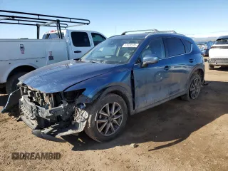 2018 Mazda CX-5 Grand Touring with VIN JM3KFBDM9J0323388, listed as a Copart auction lot 47628135 with 102,098 mi miles and Salvage Title. Bid and sale history available at carsss.com. Image 1.