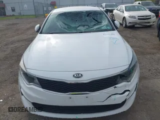 2017 Kia Optima LX z VIN 5XXGT4L38HG171236, wystawiony jako IAAI lot #42215406 z przebiegiem 83 107 mil mil oraz . Historia ofert i sprzedaży dostępna na DreamBid. Obrazek 13.