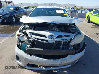 2011 Toyota Corolla L with VIN JTDBU4EE0B9151332, listed as a IAAI auction lot 41970433 with 113,157 mi miles. Bid and sale history available at carsss.com. Image 12.