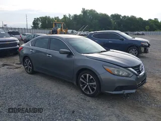 2016 Nissan Altima SR with VIN 1N4AL3AP2GC220196, listed as a IAAI auction lot 42362704 with 104,939 mi miles and . Bid and sale history available at DreamBid. Image 1.