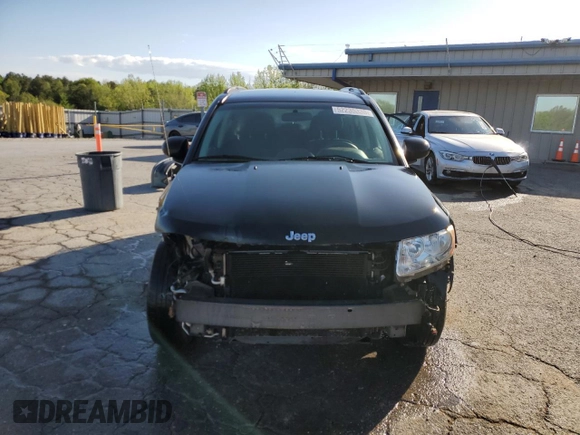 2013 Jeep Compass Sport with VIN 1C4NJDBB1DD280177, listed as a Copart auction lot 52235335 with 141,005 mi miles and Salvage Title. Bid and sale history available at carsss.com. Image 5.