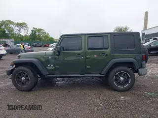 2007 Jeep Wrangler Unlimited X with VIN 1J4GA39127L231378, listed as a IAAI auction lot 42252475 with 152,568 mi miles and . Bid and sale history available at DreamBid. Image 15.
