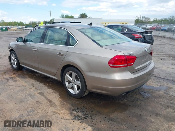 2015 Volkswagen Passat 1.8T Limited Edition with VIN 1VWAT7A32FC120769, listed as a IAAI auction lot 42013547 with 61,451 mi miles. Bid and sale history available at carsss.com. Image 3.