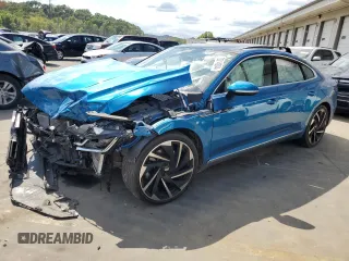 2023 Volkswagen Arteon SEL Premium R-Line z VIN WVWTR7AN8PE002467, wystawiony jako Copart lot #72014284 z przebiegiem Nie podano mil oraz Szkoda całkowita • Salvage title. Historia ofert i sprzedaży dostępna na DreamBid. Obrazek 1.
