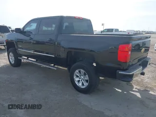 2014 Chevrolet Silverado 1500 LT with VIN 3GCPCREC2EG410735, listed as a IAAI auction lot 41879620 with 147,446 mi miles and . Bid and sale history available at DreamBid. Image 3.
