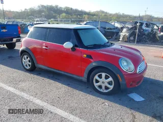 2010 MINI Hardtop with VIN WMWMF3C58ATZ21856, listed as a IAAI auction lot 41902195 with Not Provided miles and . Bid and sale history available at DreamBid. Image 1.