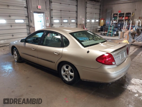 2001 Ford Taurus SES with VIN 1FAFP55S31A143202, listed as a IAAI auction lot 41950702 with 238,193 mi miles. Bid and sale history available at carsss.com. Image 3.