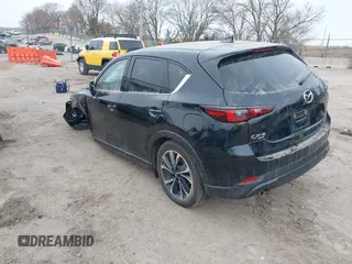 2023 Mazda CX-5 S Premium with VIN JM3KFBDM2P0221973, listed as a IAAI auction lot 41853756 with Not Provided miles and . Bid and sale history available at DreamBid. Image 3.
