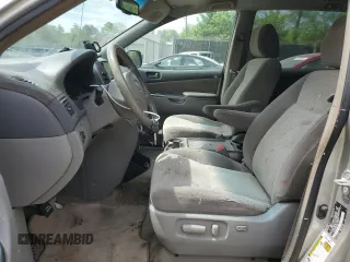 2010 Toyota Sienna CE with VIN 5TDKK4CC1AS294569, listed as a Copart auction lot 55043215 with 158,651 mi miles and Clean Title. Bid and sale history available at DreamBid. Image 7.