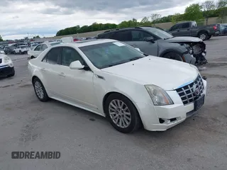2010 Cadillac CTS Luxury with VIN 1G6DG5EG5A0135060, listed as a IAAI auction lot 42331276 with 118,685 mi miles and . Bid and sale history available at DreamBid. Image 1.