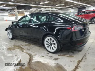 2023 Tesla Model 3 with VIN 5YJ3E1EA5PF439017, listed as a Copart auction lot 53694145 with 73,875 mi miles and Salvage Title. Bid and sale history available at DreamBid. Image 2.