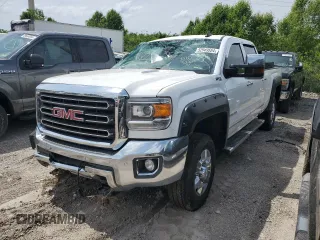 2016 GMC Sierra 2500HD SLT z VIN 1GT12TE85GF102304, wystawiony jako Copart lot #52949554 z przebiegiem 186 216 mil mil oraz Szkoda całkowita • Salvage title. Historia ofert i sprzedaży dostępna na DreamBid. Obrazek 1.