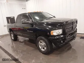 2005 Dodge Ram 3500 SLT with VIN 3D7LS38C85G810265, listed as a IAAI auction lot 41856058 with 164,027 mi miles. Bid and sale history available at carsss.com. Image 1.