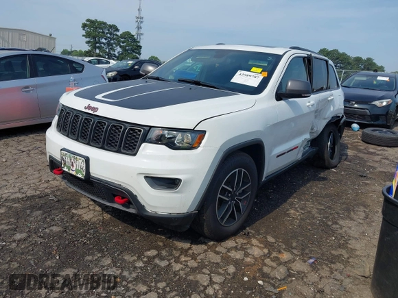 2021 Jeep Grand Cherokee Trailhawk with VIN 1C4RJFLG5MC564912, listed as a IAAI auction lot 42589787 with 25,604 mi miles and . Bid and sale history available at DreamBid. Image 17.