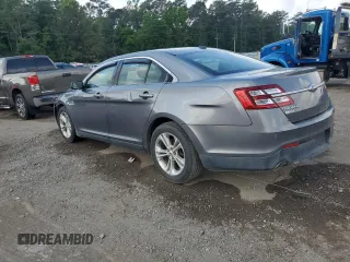 2014 Ford Taurus SEL with VIN 1FAHP2E84EG123006, listed as a Copart auction lot 53367795 with 216,092 mi miles and Salvage Title. Bid and sale history available at carsss.com. Image 2.