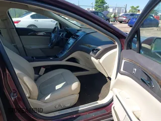 2013 Lincoln MKZ z VIN 3LN6L2GK9DR812595, wystawiony jako IAAI lot #42544413 z przebiegiem 196 159 mil mil oraz . Historia ofert i sprzedaży dostępna na DreamBid. Obrazek 5.