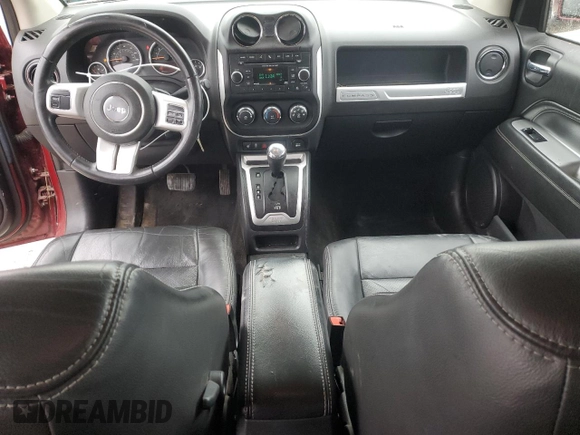 2015 Jeep Compass High Altitude Edition with VIN 1C4NJDEB4FD120048, listed as a Copart auction lot 52101005 with 143,888 mi miles and Clean Title. Bid and sale history available at carsss.com. Image 8.
