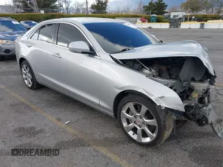 2013 Cadillac ATS Luxury with VIN 1G6AB5RX4D0154991, listed as a IAAI auction lot 41688976 with 136,238 mi miles. Bid and sale history available at carsss.com. Image 1.
