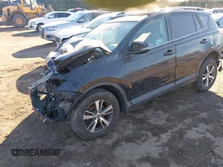 2018 Toyota RAV4 XLE with VIN 2T3RFREV2JW811214, listed as a IAAI auction lot 41458588 with 236,346 mi miles. Bid and sale history available at carsss.com. Image 16.