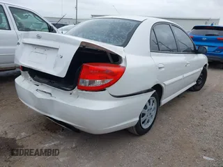 2005 Kia Rio with VIN KNADC125856400669, listed as a IAAI auction lot 41165059 with 181,338 mi miles. Bid and sale history available at carsss.com. Image 4.
