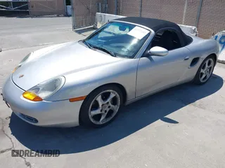 1999 Porsche Boxster with VIN WP0CA2984XU624983, listed as a IAAI auction lot 42722102 with 100,889 mi miles and . Bid and sale history available at DreamBid. Image 2.