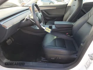 2023 Tesla Model 3 with VIN 5YJ3E1EA7PF557358, listed as a Copart auction lot 48891985 with 20,673 mi miles and Salvage title. Bid and sale history available at DreamBid. Image 7.