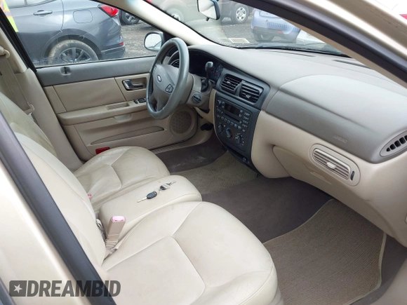 2001 Ford Taurus SES with VIN 1FAFP55S01A155758, listed as a IAAI auction lot 42152091 with 74,817 mi miles. Bid and sale history available at carsss.com. Image 5.