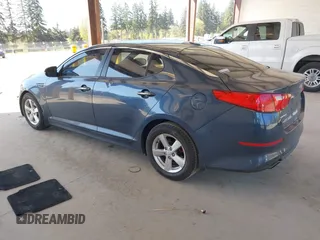 2015 Kia Optima LX with VIN KNAGM4A70F5592109, listed as a IAAI auction lot 42053533 with 159,401 mi miles. Bid and sale history available at carsss.com. Image 3.