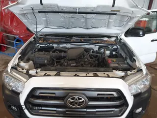 2016 Toyota Tacoma SR z VIN 5TFSX5ENXGX042148, wystawiony jako IAAI lot #41592688 z przebiegiem 126 528 mil mil oraz . Historia ofert i sprzedaży dostępna na DreamBid. Obrazek 10.