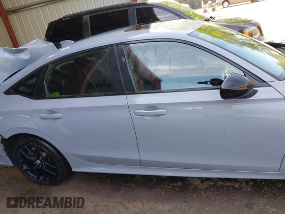 2022 Honda Civic Si with VIN 2HGFE1E52NH474042, listed as a IAAI auction lot 42099415 with 26,828 mi miles and . Bid and sale history available at DreamBid. Image 13.