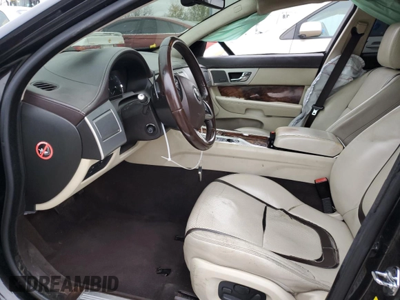 2015 Jaguar XF V6 Portfolio with VIN SAJWA0F78F8U87018, listed as a Copart auction lot 79106944 with 108,752 mi miles and Salvage Title. Bid and sale history available at carsss.com. Image 7.