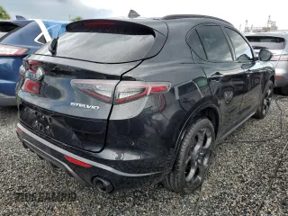 2024 Alfa Romeo Stelvio Veloce z VIN ZASPAKBNXR7D76183, wystawiony jako Copart lot #74106334 z przebiegiem Nie podano mil oraz Nie do naprawy • Non repairable. Historia ofert i sprzedaży dostępna na DreamBid. Obrazek 3.