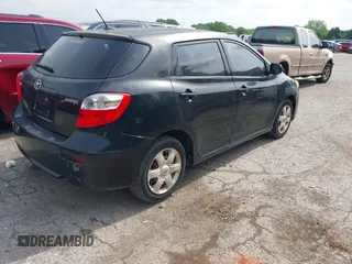 2009 Toyota Matrix with VIN 2T1KU40EX9C013986, listed as a IAAI auction lot 42117914 with 151,113 mi miles. Bid and sale history available at carsss.com. Image 4.