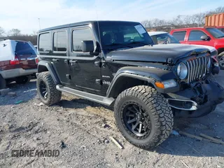 2021 Jeep Wrangler Unlimited Sahara with VIN 1C4HJXEG5MW595929, listed as a IAAI auction lot 41379250 with 63,537 mi miles and . Bid and sale history available at DreamBid. Image 1.