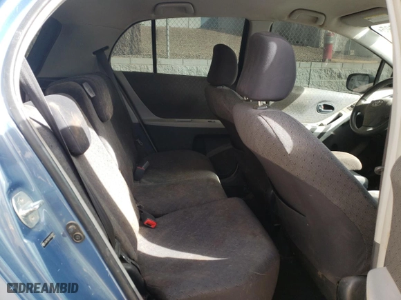 2009 Toyota Yaris with VIN JTDKT903195234291, listed as a Copart auction lot 46946795 with 152,625 mi miles and Salvage Title. Bid and sale history available at carsss.com. Image 11.