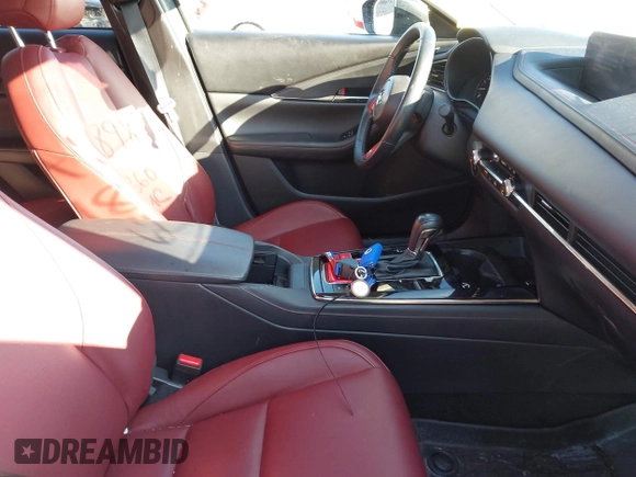2023 Mazda CX-30 S Carbon Edition with VIN 3MVDMBCM3PM579345, listed as a IAAI auction lot 41689892 with 18,621 mi miles and . Bid and sale history available at DreamBid. Image 5.