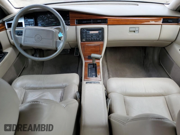 1992 Cadillac Seville z VIN 1G6KY53BXNU804126, wystawiony jako Copart lot #69219394 z przebiegiem 100 647 mil mil oraz Czysty tytuł • Clean title. Historia ofert i sprzedaży dostępna na DreamBid. Obrazek 8.