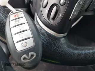 2013 Infiniti JX35 z VIN 5N1AL0MMXDC306339, wystawiony jako IAAI lot #42364060 z przebiegiem 237 711 mil mil oraz . Historia ofert i sprzedaży dostępna na DreamBid. Obrazek 11.