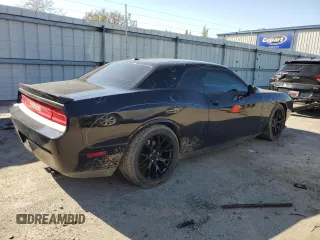 2014 Dodge Challenger R/T z VIN 2C3CDYBT2EH165224, wystawiony jako Copart lot #48183855 z przebiegiem 139 037 mil mil oraz Szkoda całkowita • Salvage title. Historia ofert i sprzedaży dostępna na DreamBid. Obrazek 3.