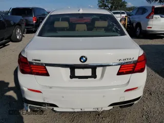 2014 BMW 7 Series 740Li xDrive with VIN WBAYF4C58ED281977, listed as a Copart auction lot 44084005 with 154,592 mi miles and Clean Title. Bid and sale history available at carsss.com. Image 6.