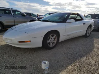 1997 Pontiac Firebird Firebird z VIN 2G2FS22K5V2232134, wystawiony jako Copart lot #74087964 z przebiegiem Nie podano mil oraz Szkody całkowita. Historia ofert i sprzedaży dostępna na DreamBid. Obrazek 1.