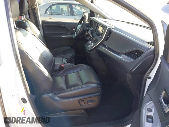 2018 Toyota Sienna SE with VIN 5TDXZ3DC9JS958563, listed as a IAAI auction lot 41650952 with 127,636 mi miles and . Bid and sale history available at DreamBid. Image 5.