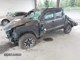2022 Toyota Tacoma SR z VIN 3TMCZ5ANXNM493703, wystawiony jako IAAI lot #42139285 z przebiegiem 42 572 mil mil oraz . Historia ofert i sprzedaży dostępna na DreamBid. Obrazek 18.