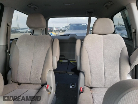 2012 Kia Sedona LX with VIN KNDMG4C79C6502438, listed as a Copart auction lot 77833384 with 169,459 mi miles and Clean Title. Bid and sale history available at carsss.com. Image 10.